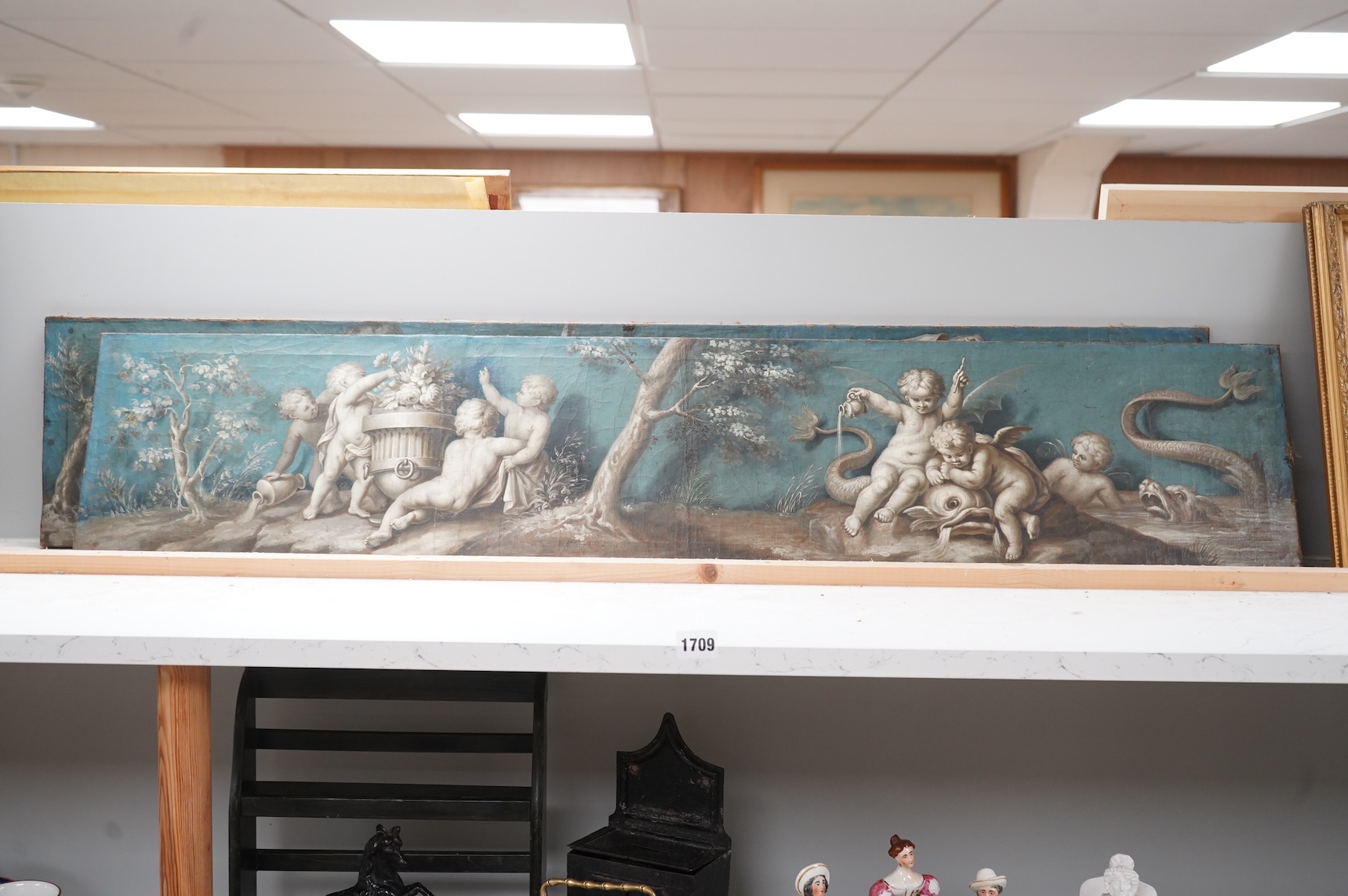 18th century, Italian School, Classical compositions, cherubs and dolphins, pair of oils on canvas, unframed, 23 x 113cm